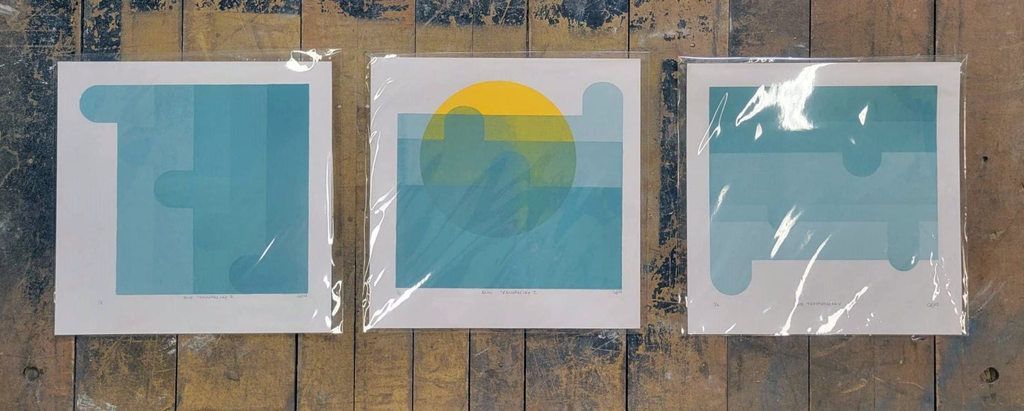 Set of three Blue Transparency I, II, III screen prints by Claire Davis on vinyl by InkBird; geometric shapes, yellow semicircle center print.