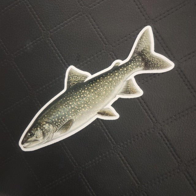 InkBird Print Studio die cut vinyl sticker of a speckled, pointed-head fish on black grid surface; durable waterproof adhesive. Printed for Good Days Marina