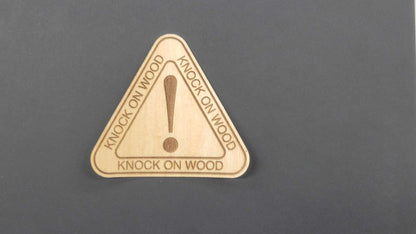 Triangular wood veneer sticker by InkBird Print Studio, laser-cut with exclamation mark and “KNOCK ON WOOD” on each side.
