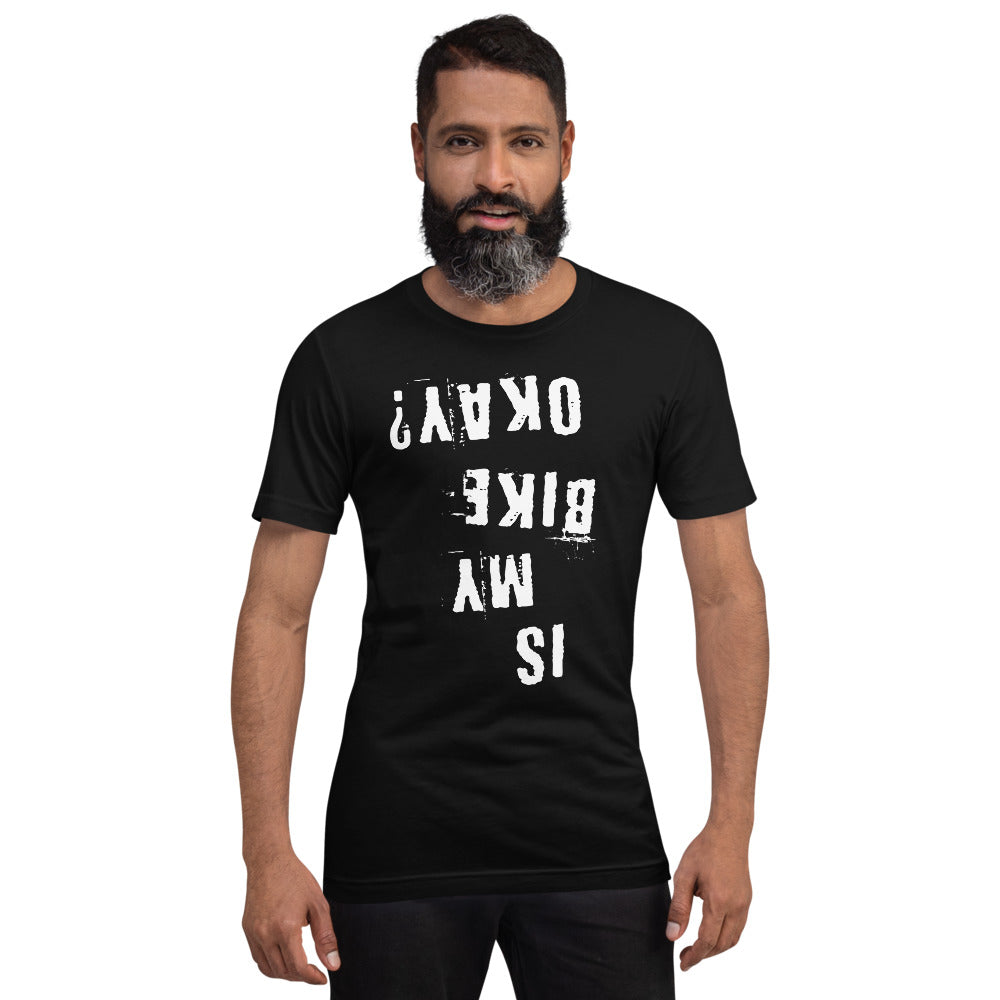 Black cotton t-shirt with upside-down “Is My Bike Okay?” in white vinyl print, worn by a bearded man; ideal for cyclists.
